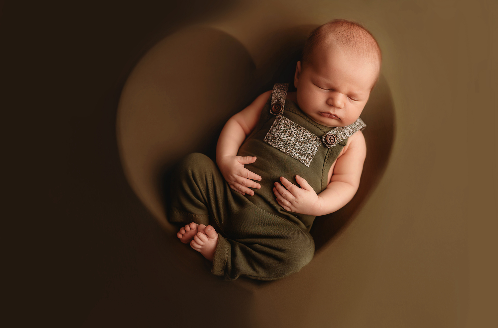 Infant posed for Newborn Photos in Charleston, SC.