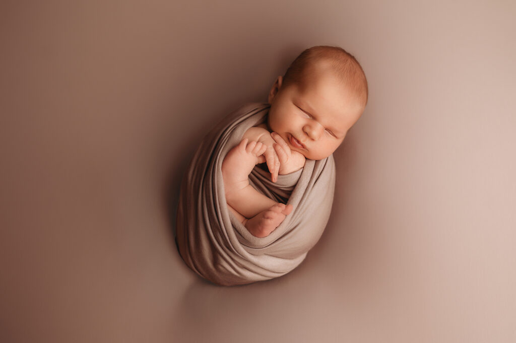 Baby posed for Newborn Photoshoot in Charleston, SC. 
