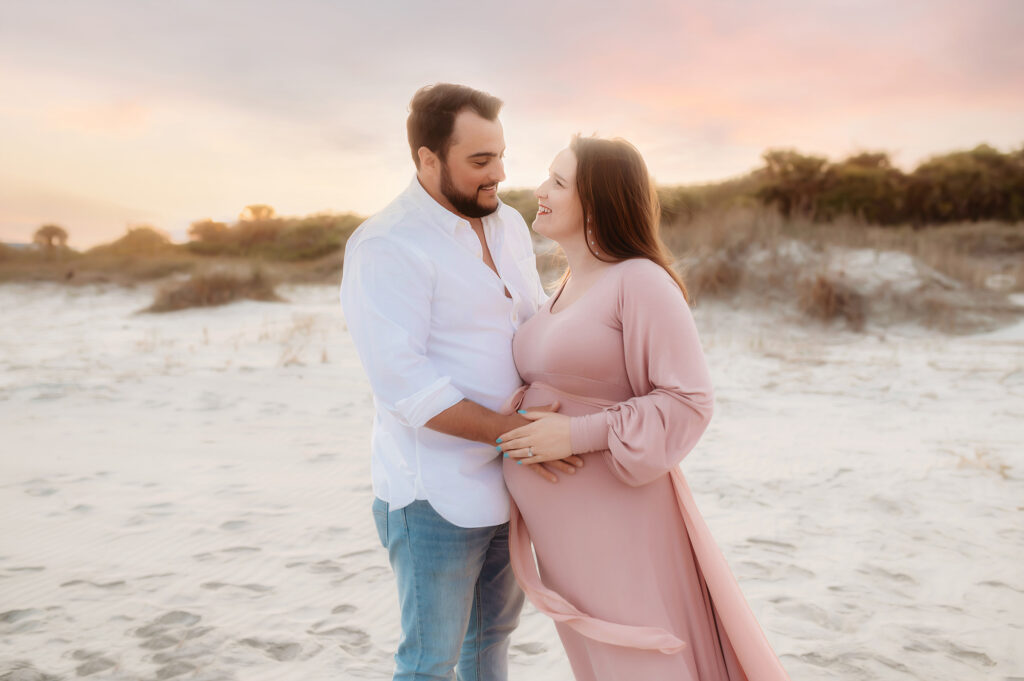 Expectant parents pose for Maternity Photos in Charleston, SC.