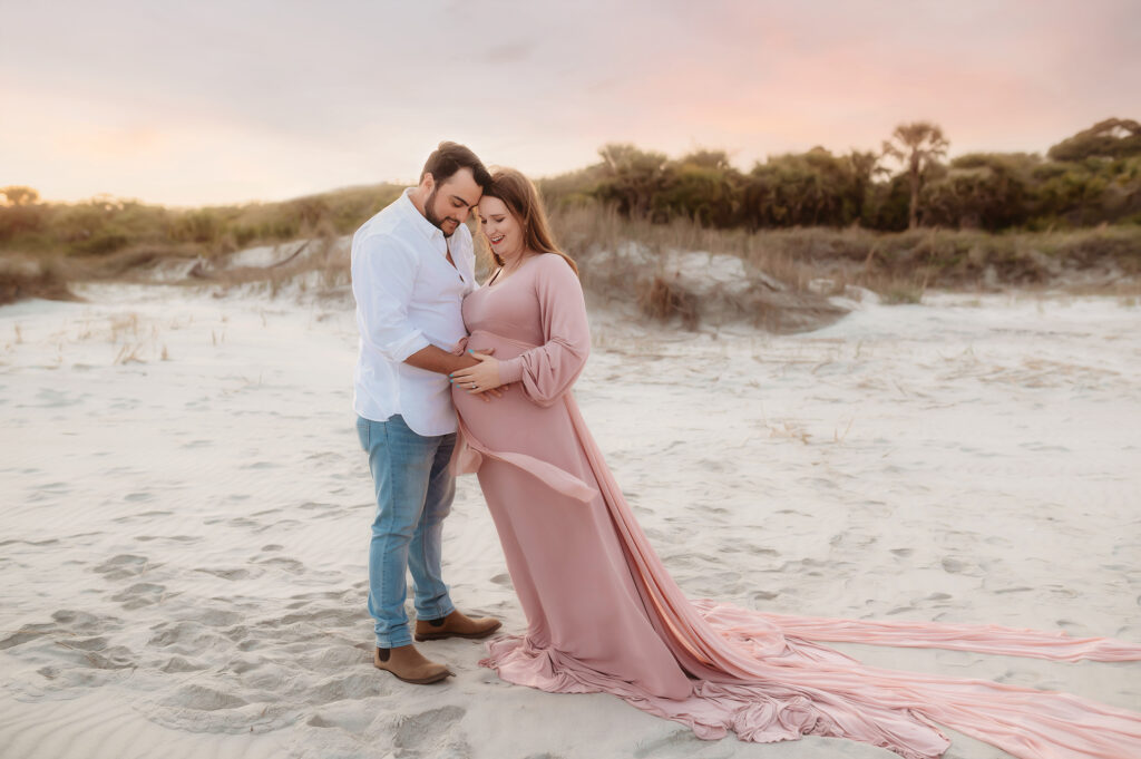 Expectant parents pose for Maternity Photos in Charleston, SC. 