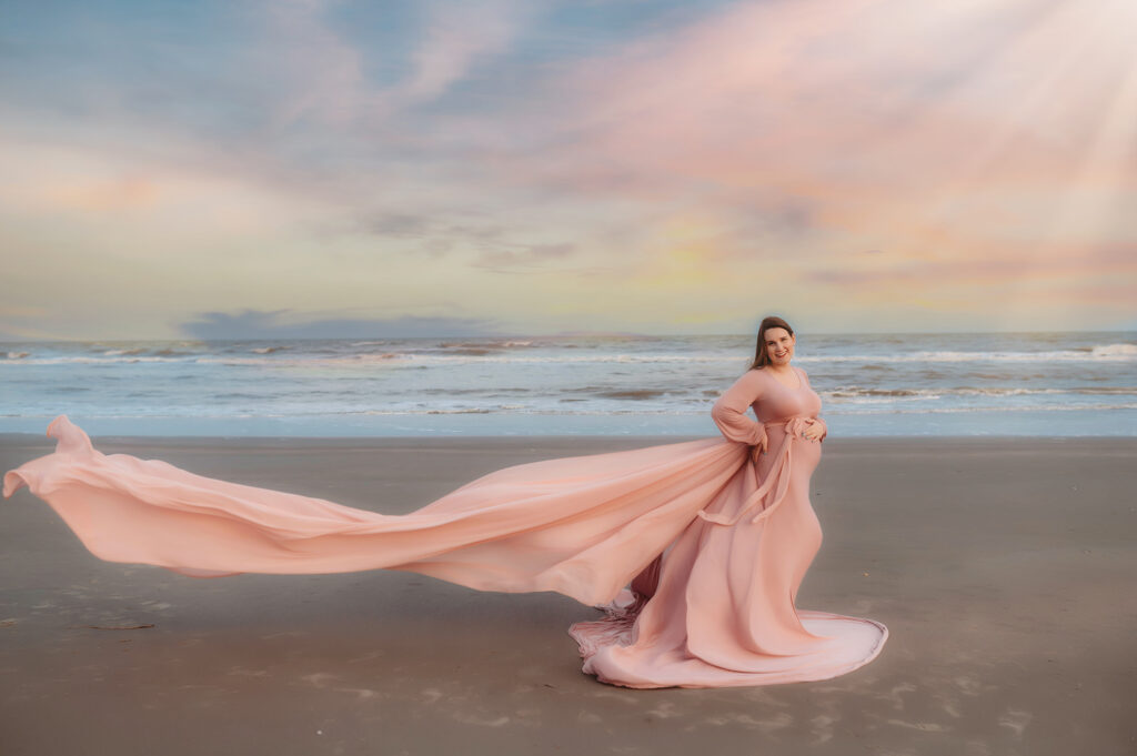 Expectant mother poses for Maternity Portraits on Folly Beach in Charleston, SC.