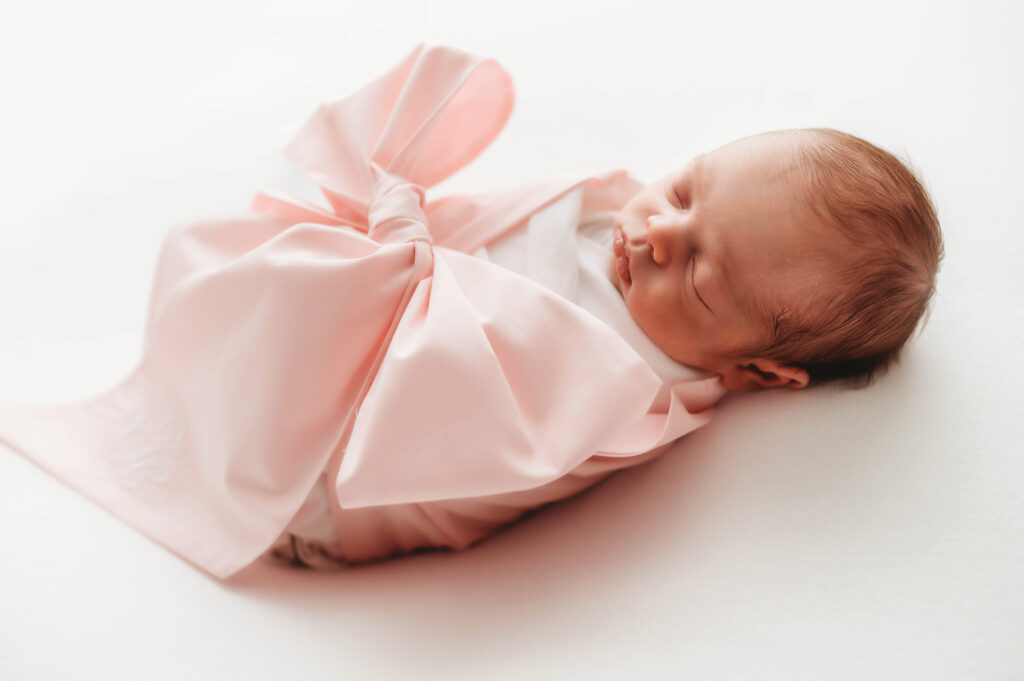 Infant posed for Newborn Photoshoot in Charleston, South Carolina. 