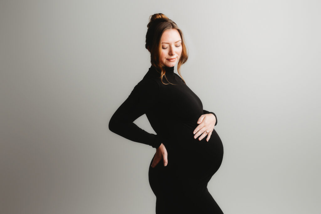 Pregnant woman poses for Studio Maternity Photography in Charleston.
