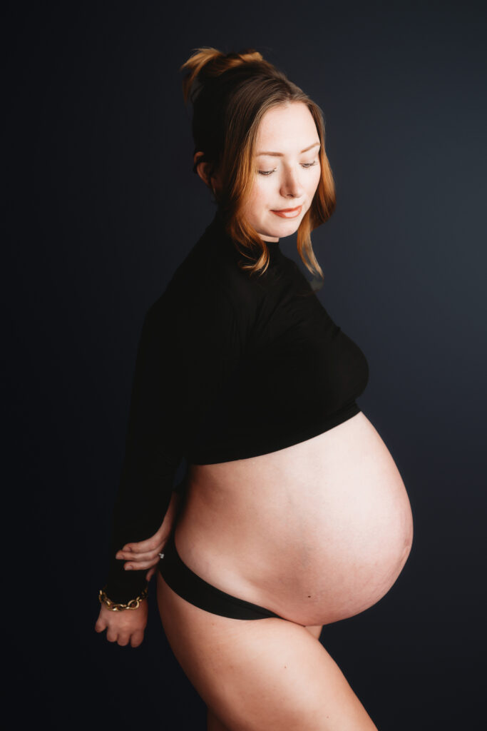Pregnant woman poses for Studio Maternity Photography in Charleston.
