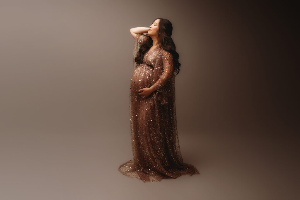 Expectant mother poses for Studio Maternity Portraits in Charleston, SC and discusses what to pack in your hospital bag.