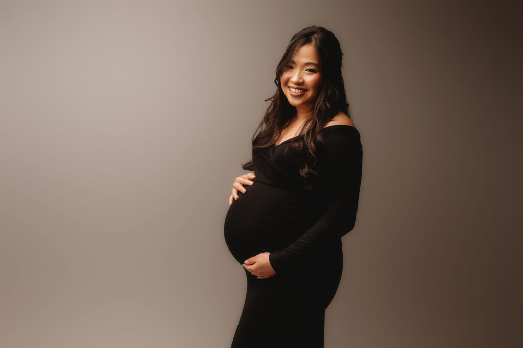 Expectant mother poses for Studio Maternity Portraits in Charleston, SC 