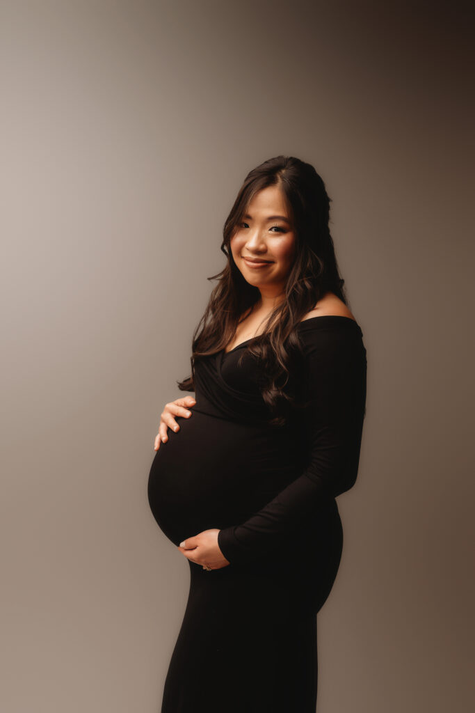 Expectant mother poses for Studio Maternity Portraits in Charleston, SC 
