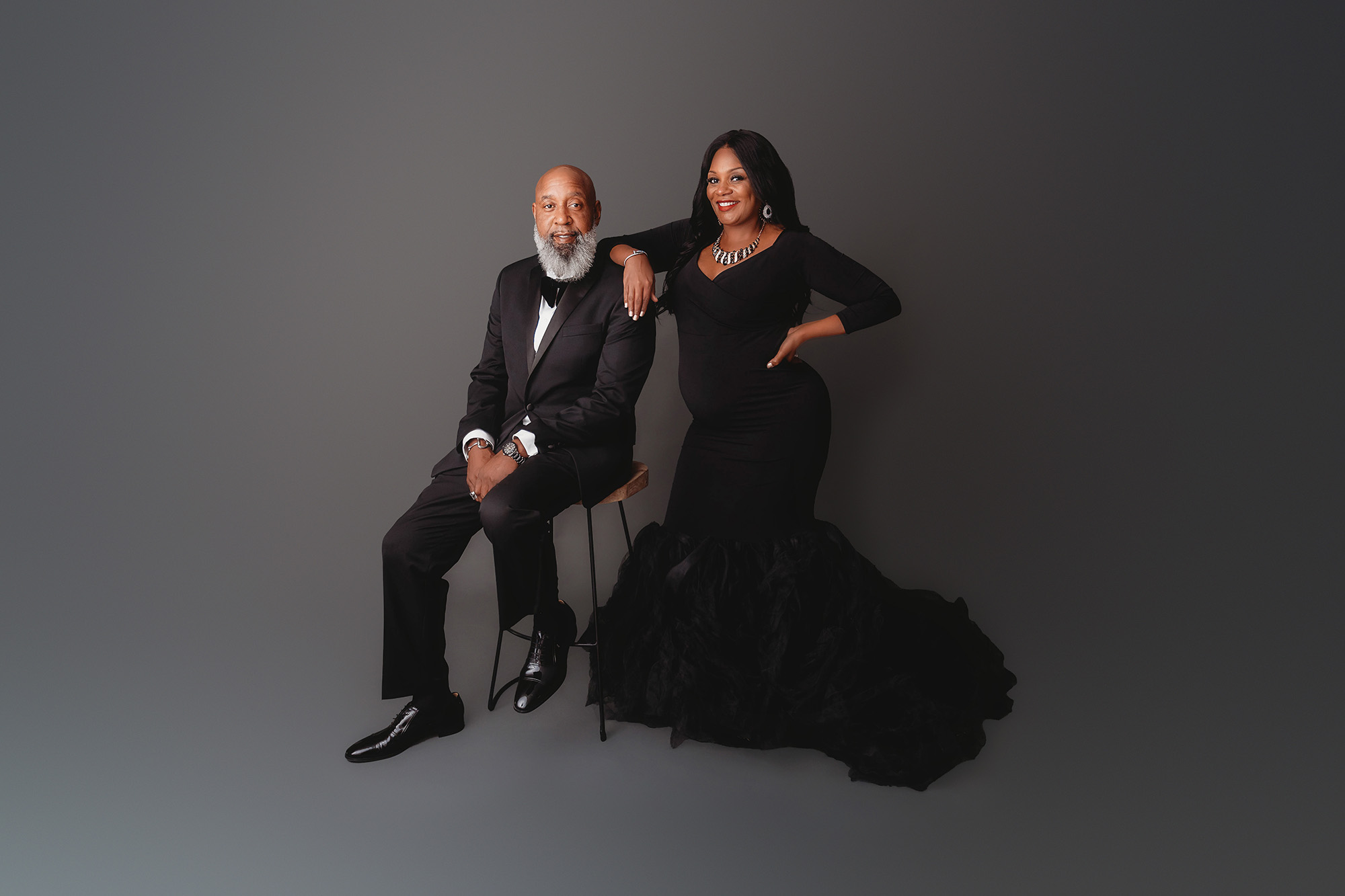 Expectant parents pose for Fine Art, Editorial-style Studio Maternity Portraits in Charleston, South Carolina.