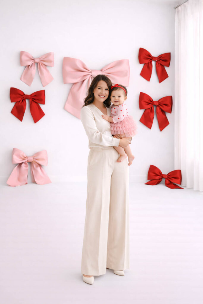 Mother embraces her baby during Valentine's Mini Session in Charleston, SC.