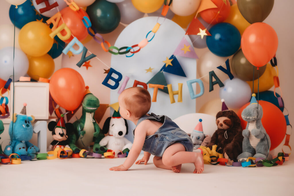 Baby plays in birthday cake during his Cake Smash Photoshoots in Charleston.