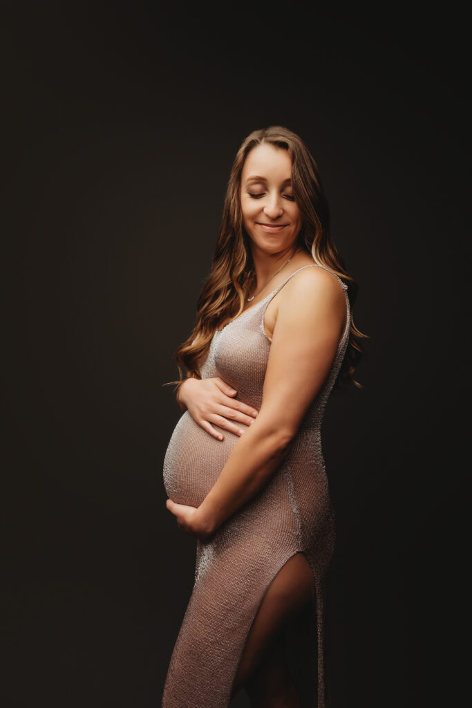 Expectant mother poses for Studio Maternity Portrait Session at Holy City Babies Portrait Studio in Charleston, SC.