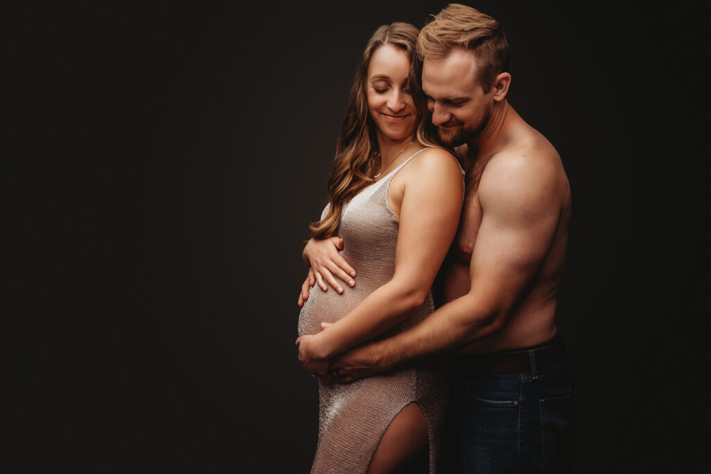 Expectant mother poses for Studio Maternity Portrait Session at Holy City Babies Portrait Studio in Charleston, SC.