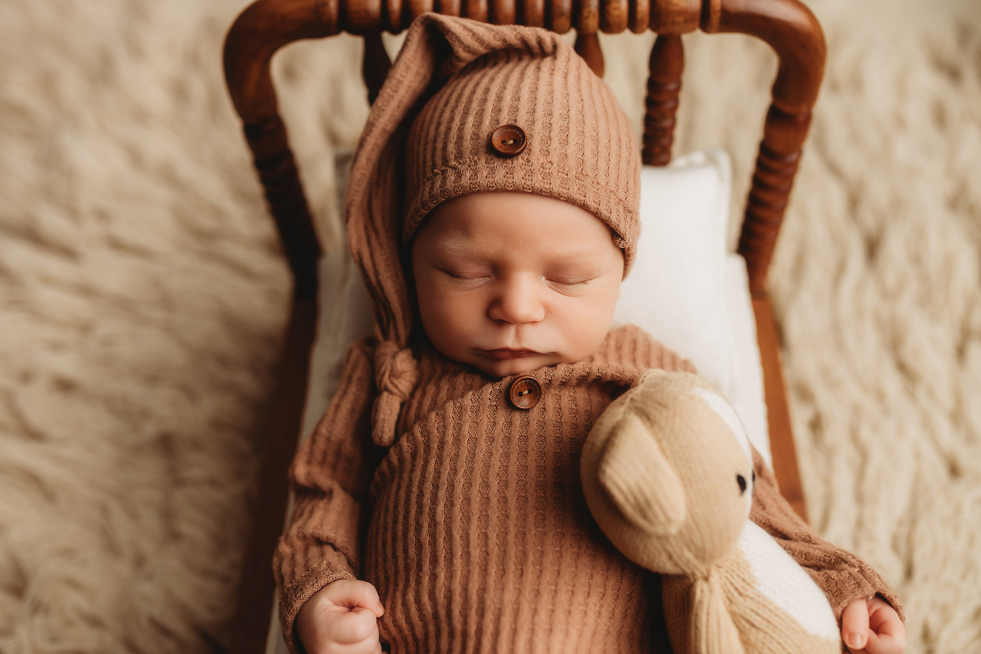 Baby posed for Newborn Portraits at Holy City Babies Portrait Studio, a Full-Service Newborn Photography Studios in Charleston.