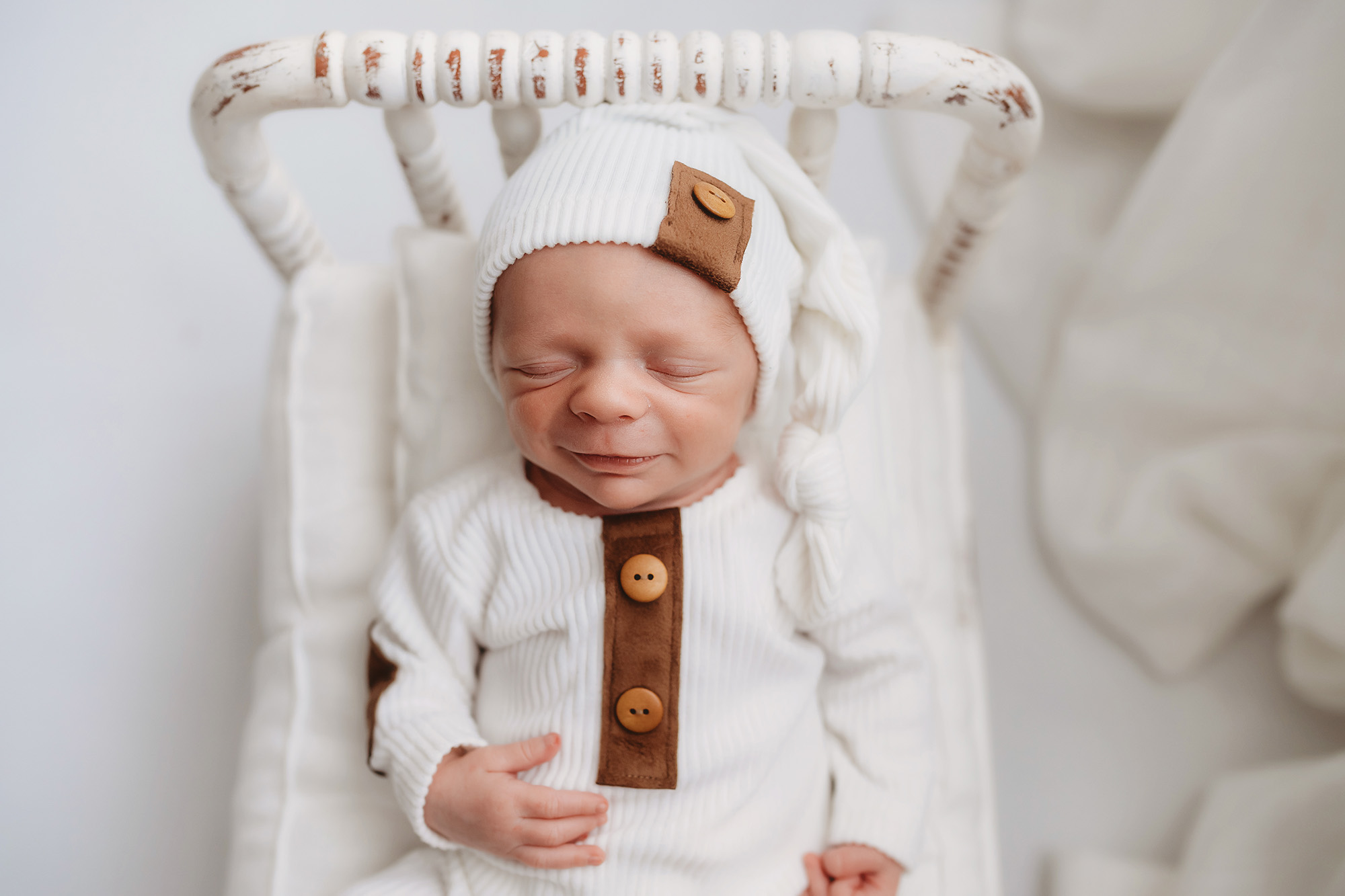 Newborn Baby posed for Luxury Newborn Photography Session at Holy City Babies Portrait Studio in Charleston, SC.