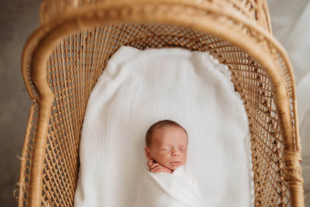 Newborn Baby posed for Newborn Portrait Session at Holy City Babies Portrait Studio in Charleston, SC. 