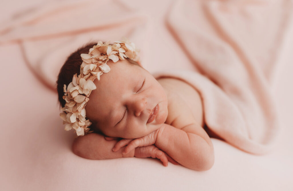 Newborn posed for Newborn Portraits at Holy City Babies Portrait Studio in Charleston, SC.