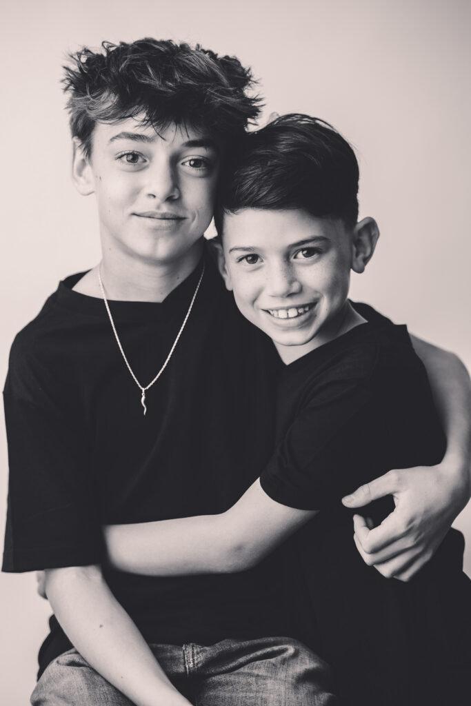 Brothers sit for Personality Portraits in Charleston at Holy City Babies Portrait Studio. 