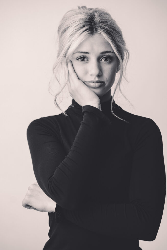 Young girl sits for Personality Portraits in Charleston at Holy City Babies Portrait Studio. 