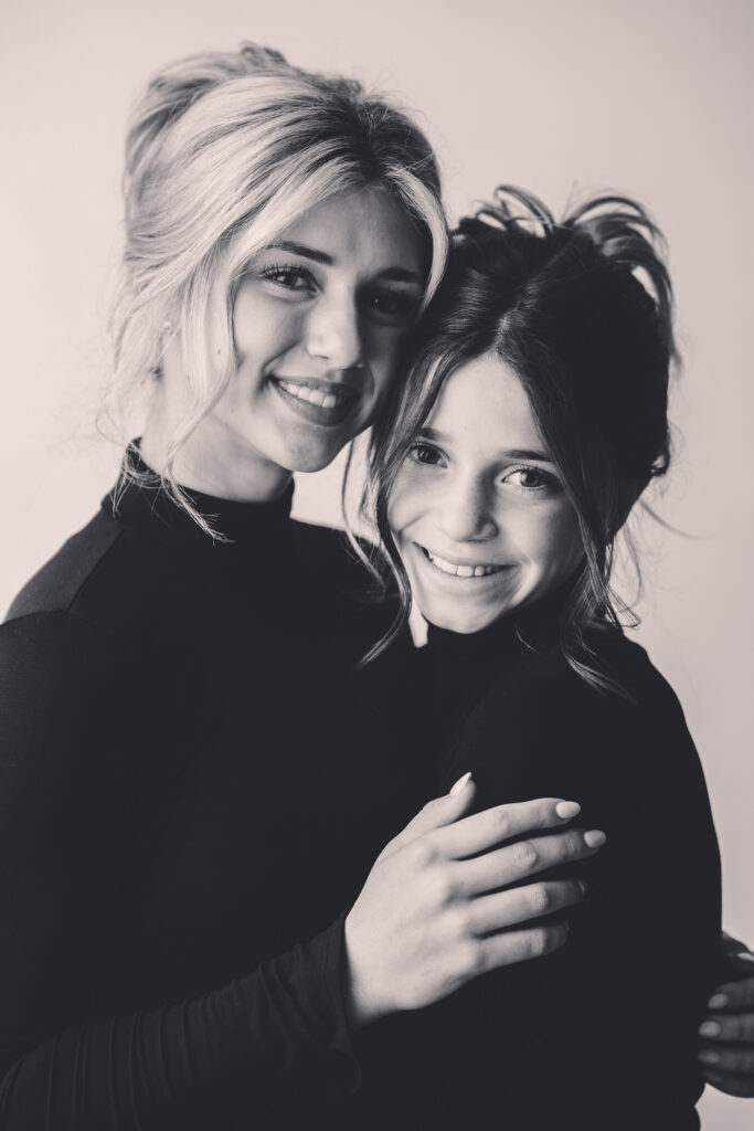 Sisters sit for Personality Portraits in Charleston at Holy City Babies Portrait Studio. 