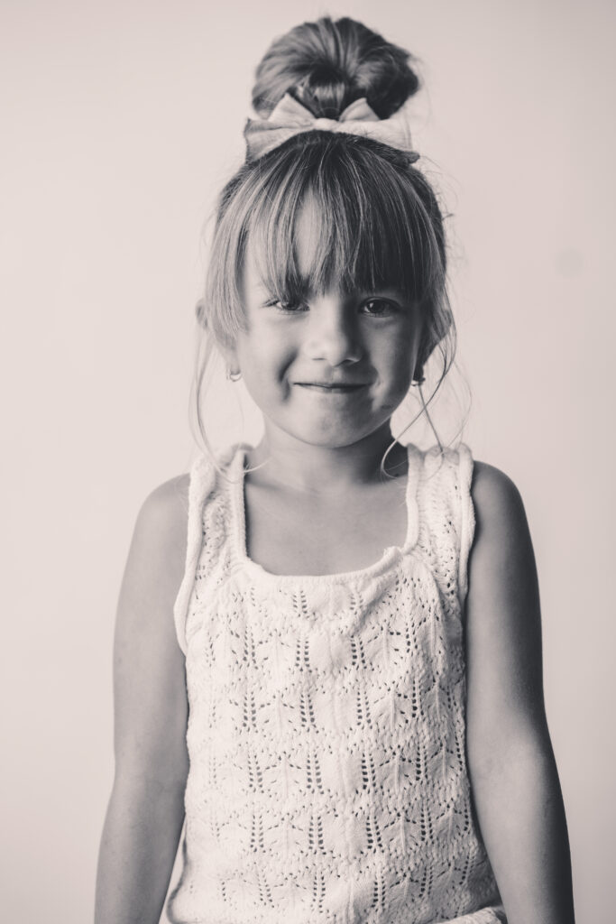 Little girl sits for Personality Portraits in Charleston at Holy City Babies Portrait Studio.