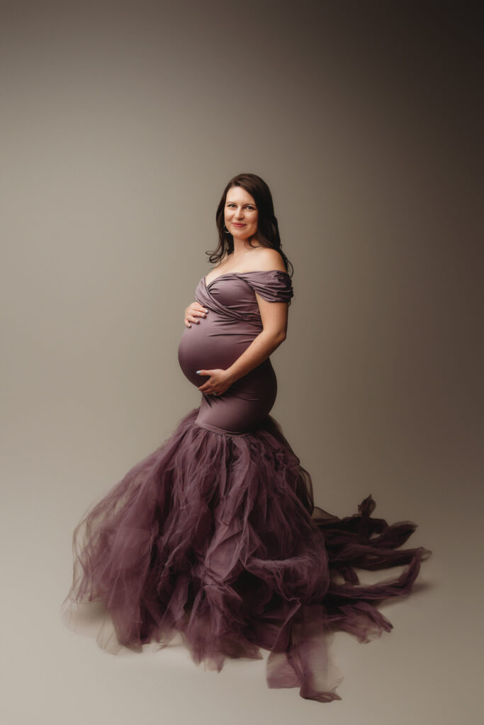 Pregnant woman poses for Editorial Maternity Portraits at Holy City Babies Portrait Studio in Charleston, SC. 