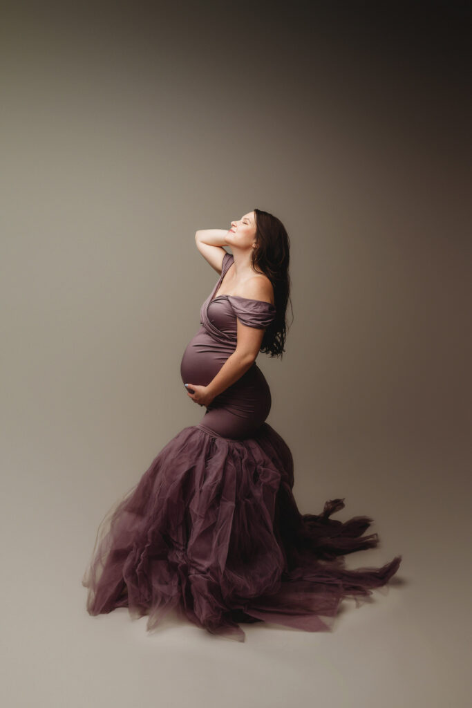 Pregnant woman poses for Editorial Maternity Portraits at Holy City Babies Portrait Studio in Charleston, SC. 