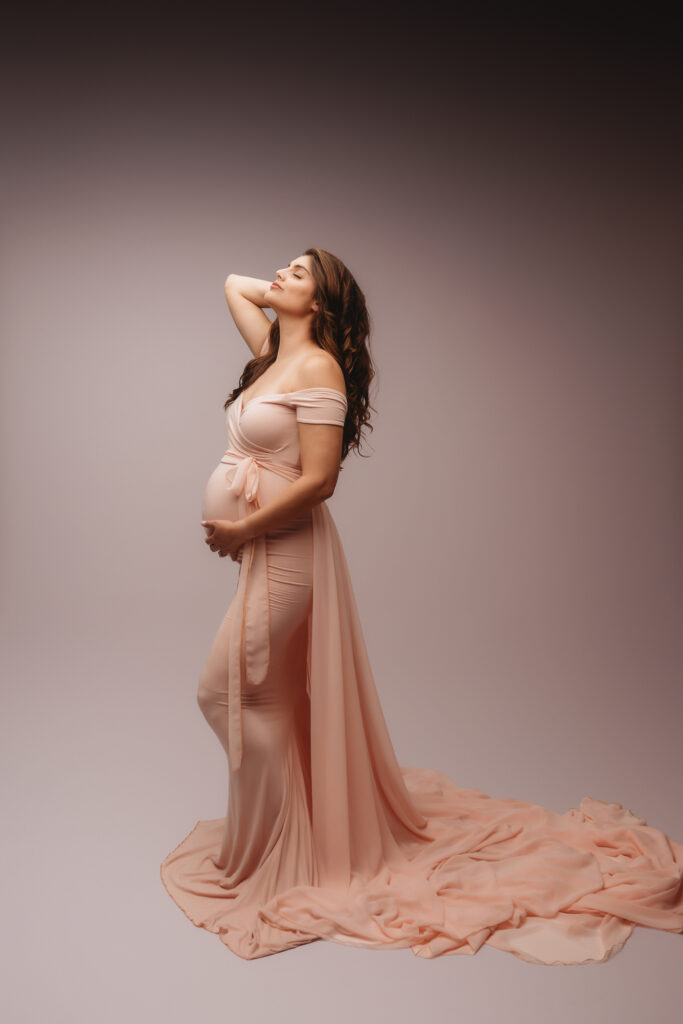 Expectant Mother poses for Studio Maternity Portrait Session at Holy City Babies Maternity Portrait Studio in Charleston, SC.