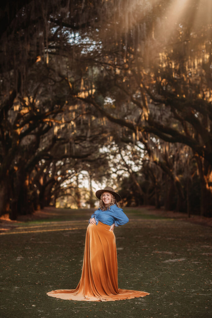 Pregnant Mother poses for Maternity Photos at Charles town Landing  in Charleston, SC.