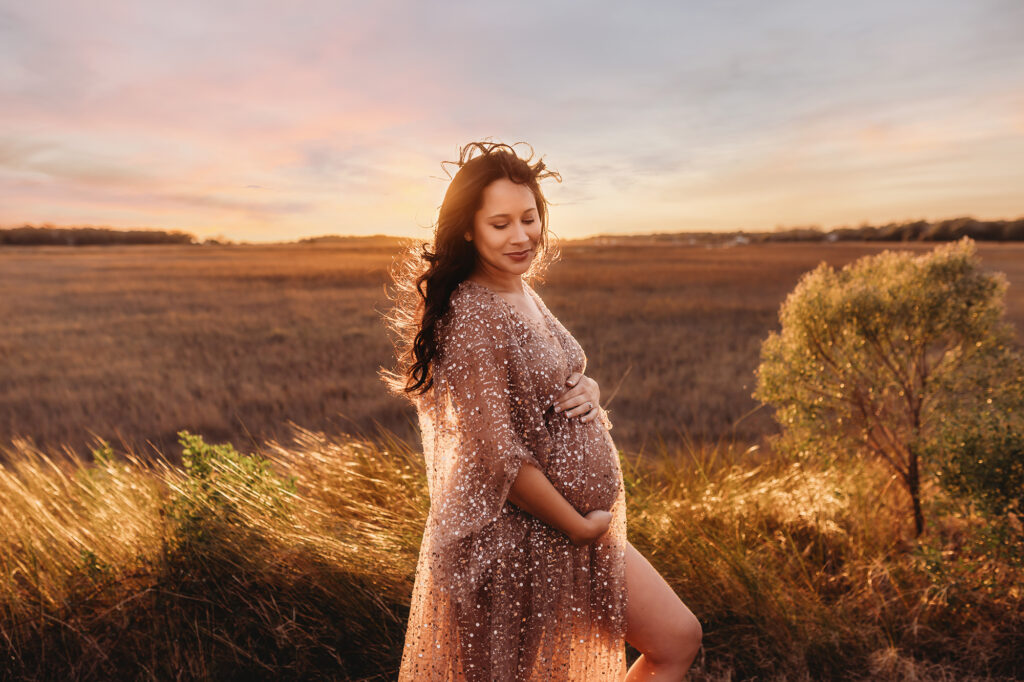 Expectant Mother poses for Maternity Photos on Folly Beach.