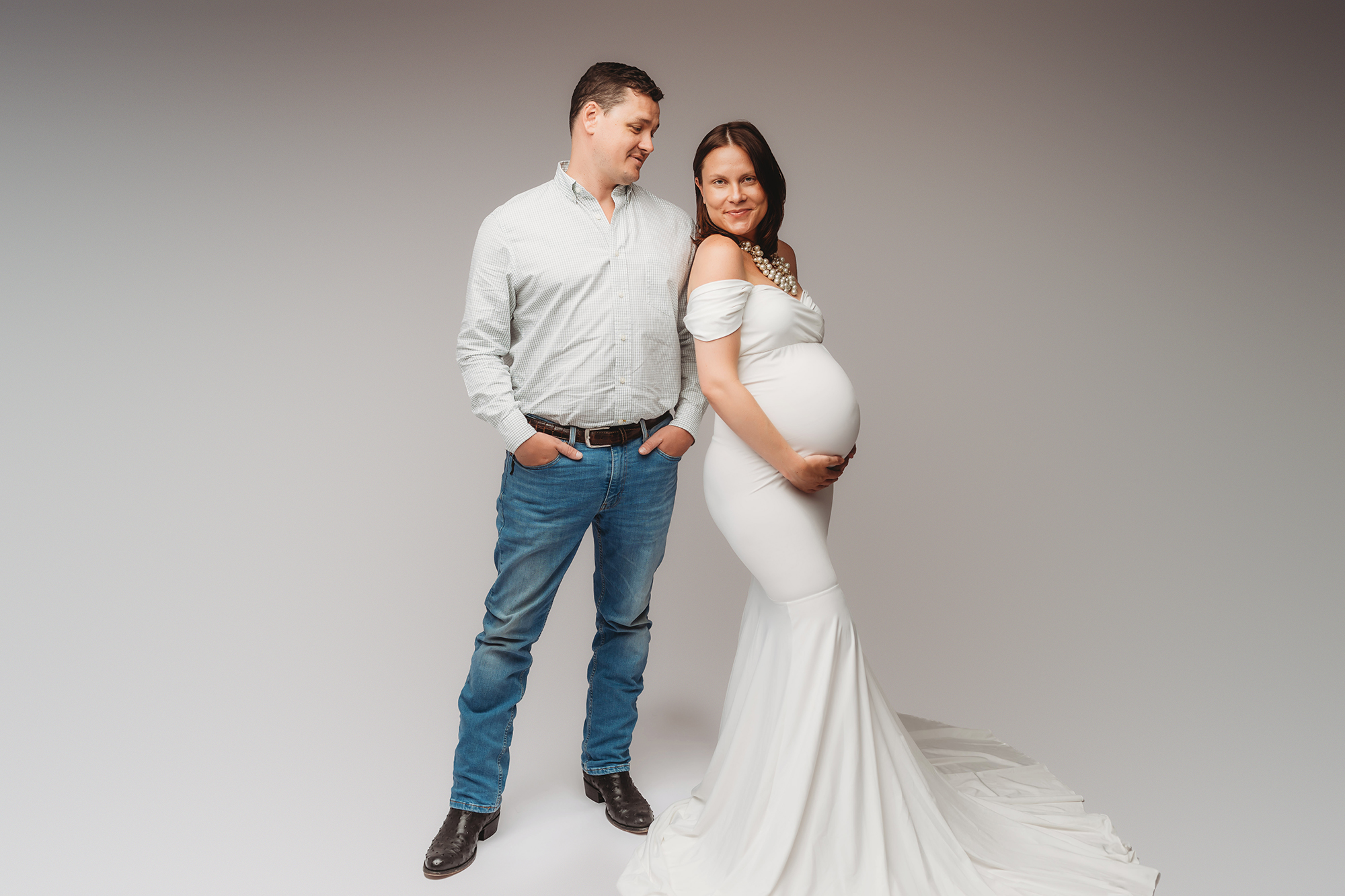 Expectant Parents pose for Studio Maternity Portraits at Holy City Babies Portrait Studio in Charleston, SC.
