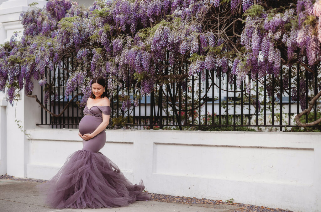 Expectant Mother poses for Maternity Photoshoot in downtown  Charleston, SC.