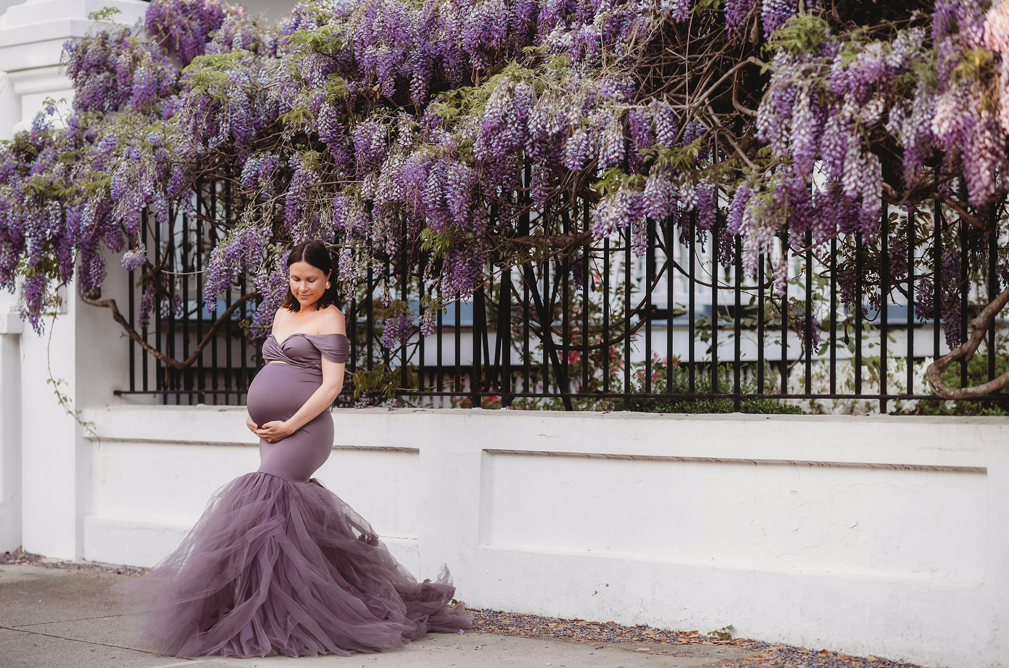 Expectant Mother poses for Maternity Portraits with Holy City Babies Maternity Photographer in downtown, Charleston, SC.