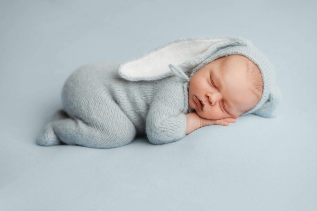 Luxury Newborn Photos in Charleston,SC studio portrait of sleeping newborn baby.