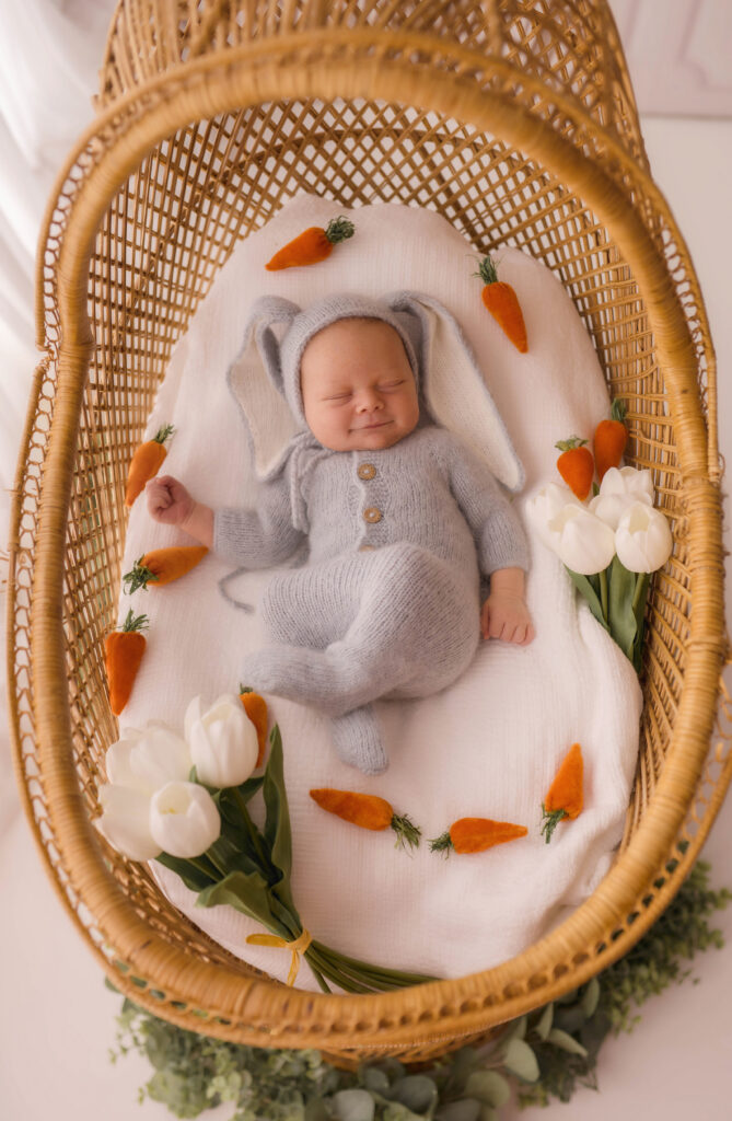 Best Newborn Photographer in Charleston,SC studio portrait of sleeping newborn baby.