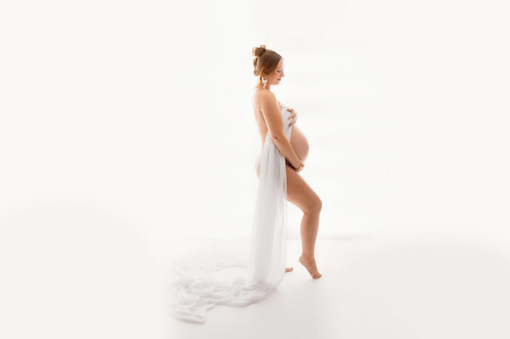 Expectant Mother poses for Studio Maternity Portrait Session at Holy City Babies Maternity Portrait Studio in Charleston, SC.