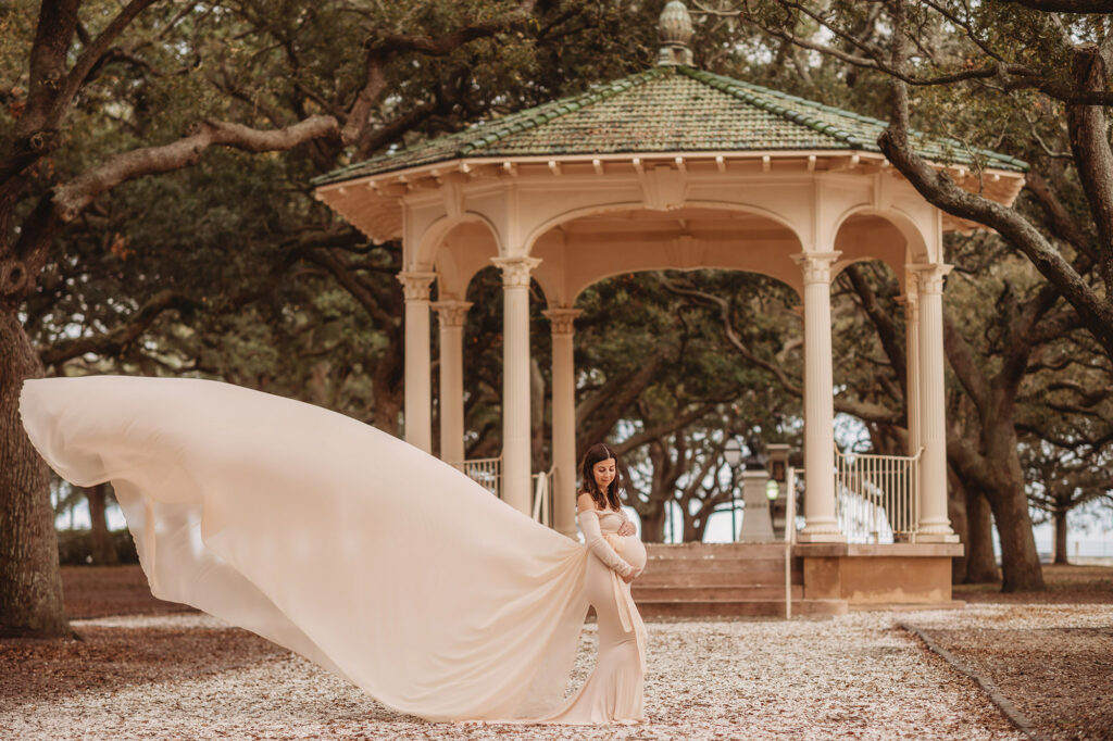 Expectant Mother poses for Maternity Photos at White Point Garden in Charleston, SC.