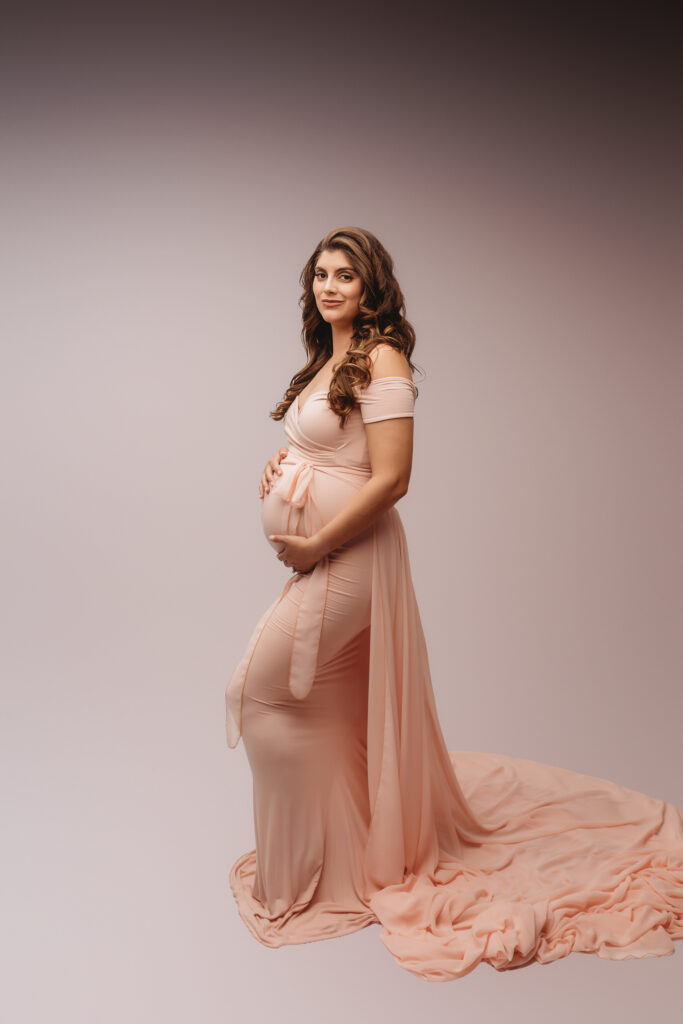 Pregnant mother poses for Studio Maternity Portraits at Holy City Babies Portrait Studio in Charleston, SC. 