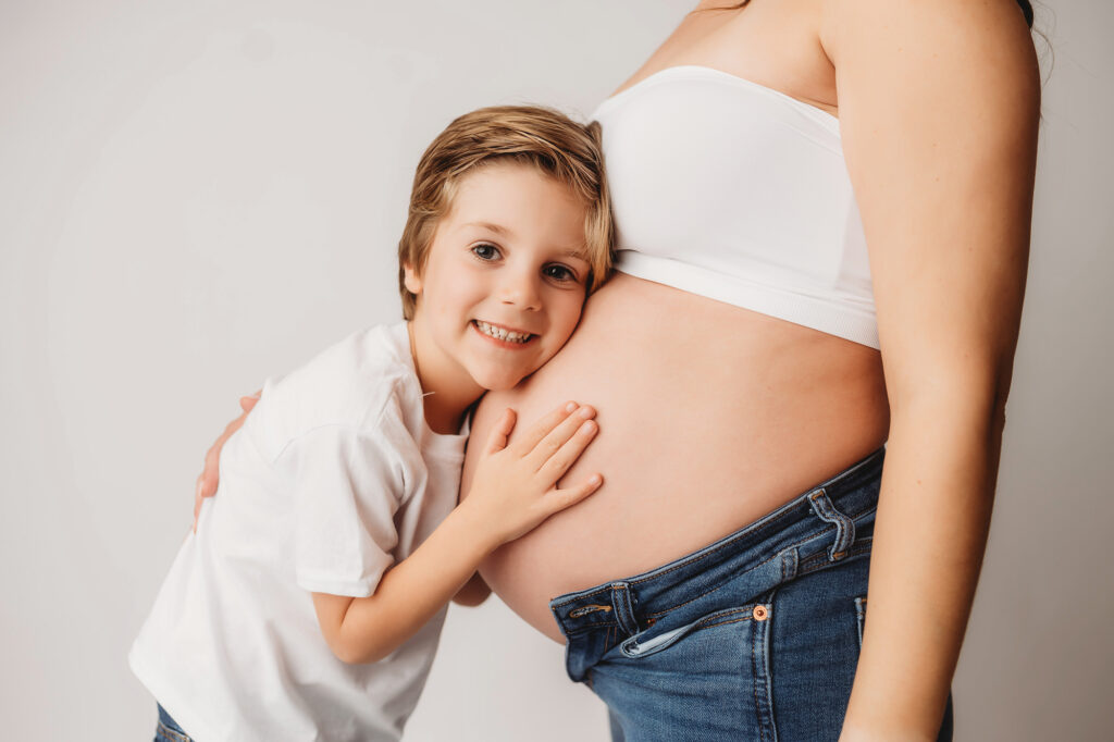 Pregnant mother poses for Studio Maternity Portraits at Holy City Babies Portrait Studio in Charleston, SC. 