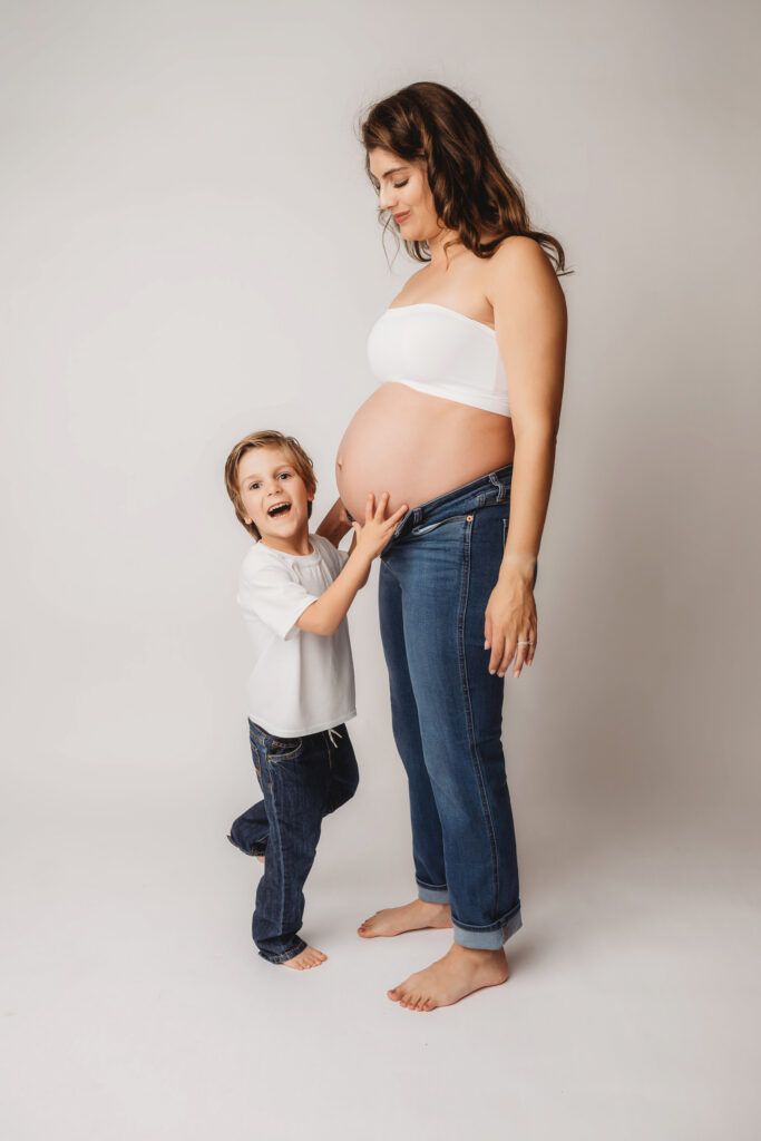 Charleston Maternity Photographer |  What to Wear for Maternity Photos - Pregnant mother poses for Studio Maternity Portraits at Holy City Babies Portrait Studio in Charleston, SC. 