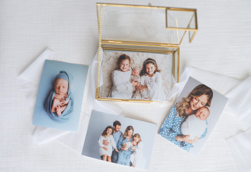 Holy City Babies Newborn Photography Studio in Charleston, SC offers a Full Service, Luxury Portrait Experience including selection of collection of archival artwork including professionally framed wall art, gallery-wrapped canvases, handcrafted heirloom albums, archival image folio boxes featuring matted fine art prints, keepsake print boxes, tabletop acrylic photo blocks, professionally matted gift prints, and custom-designed holiday cards and birth announcements.