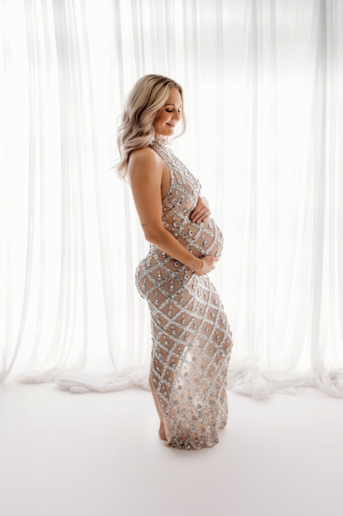 Pregnant mother poses for Maternity Portraits at Holy City Babies Portrait Studio after learning about The 10 Best Babymoon Destinations from Charleston | Weekend Getaways for Expecting Parents within 4 hours of Charleston, SC (2026 Guide)
